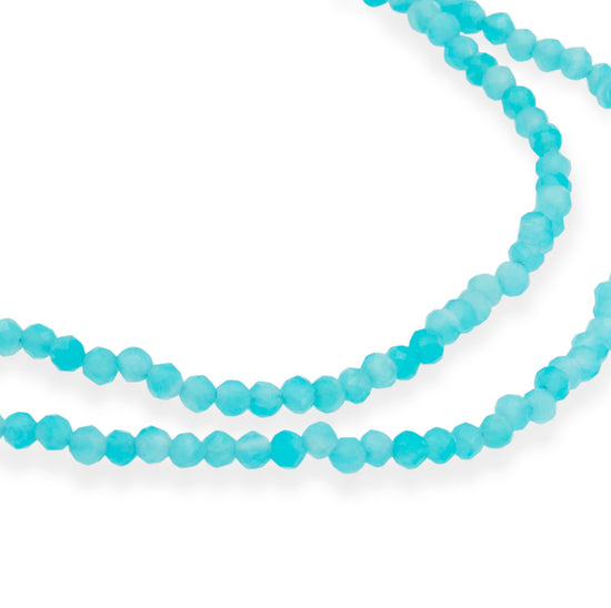 The Seven small round turquoise beaded strand